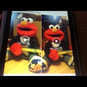 Guitar playing Elmo